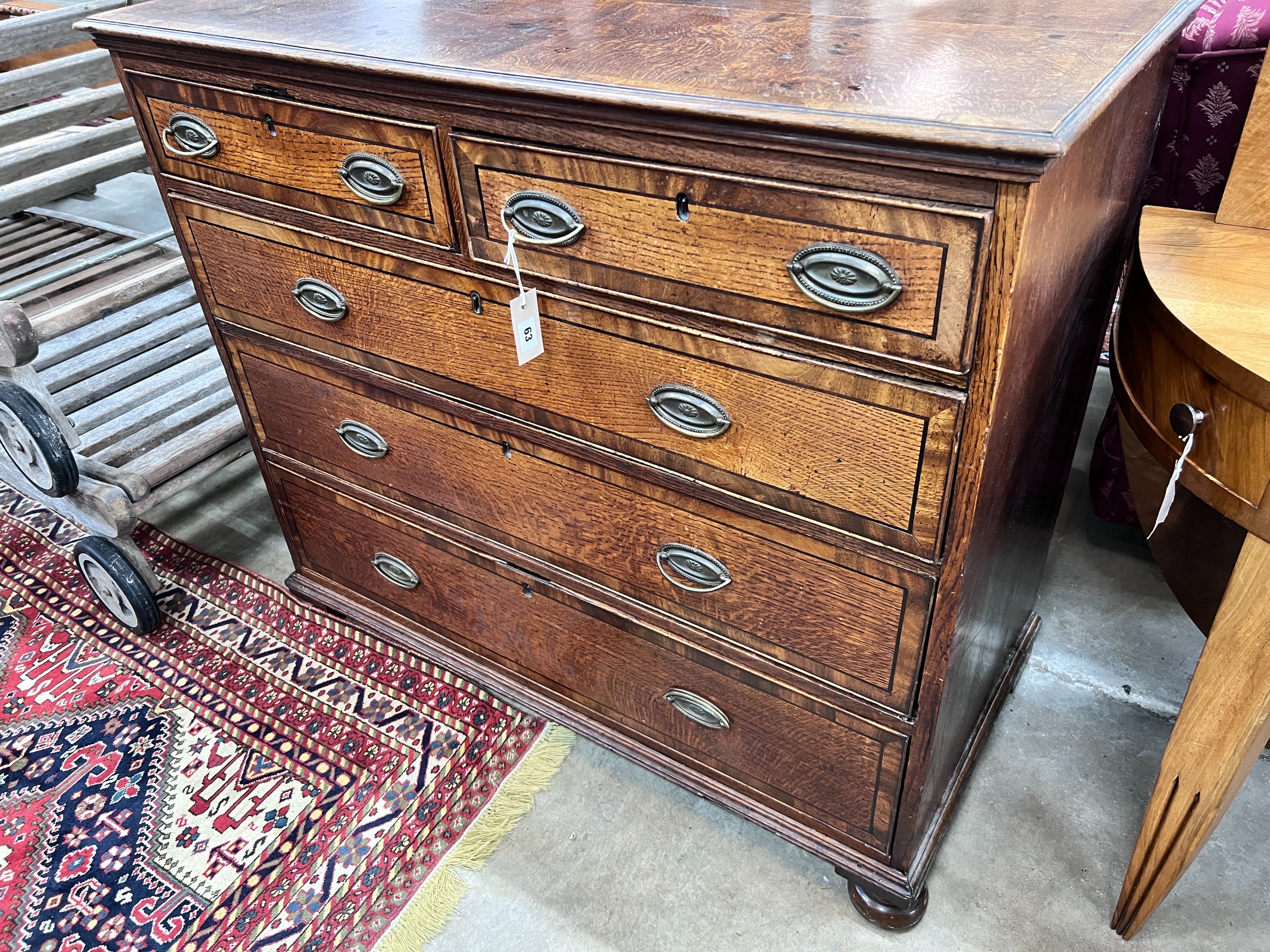 A George IV banded oak chest, width 112cm, depth 53cm, height 96cm *Please note the sale commences at 9am.